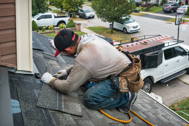 Professional Roofing technician working in Brogan, OR